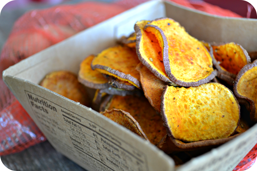 easy homemade baked sweet potato chips are a healthier alternative when it comes to snacking. Sweet Potato Chips benefits are many including fighting inflammation in the body and are very immune boosting. These are much better for you so go ahead and eat a handful or two!